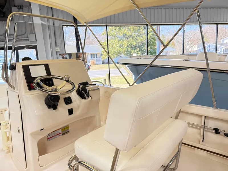 Slide: The Image of Grady-White Fisherman 180, 2025, interior view of the boat. - 6