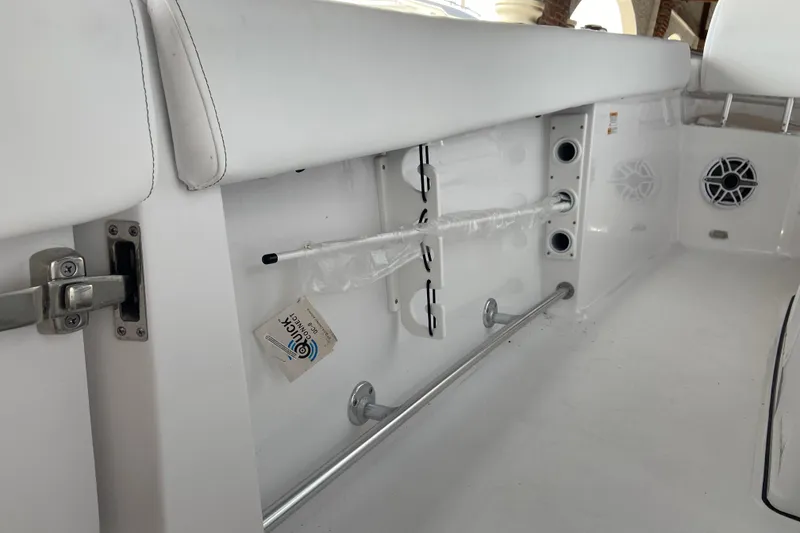 Slide: The Image of Interior view of 2026 Sportsman Heritage 261 Center Console boat, showcasing seating and storage features. - 40