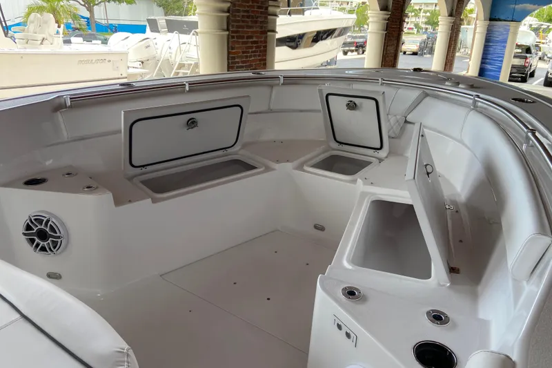 Slide: The Image of 2026 Sportsman Heritage 261 Center Console boat interior with open storage compartments. - 46