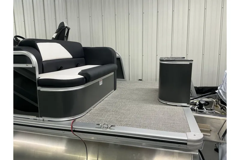 Slide: The Image of 2026 Avalon Venture 19 CRB pontoon boat with sleek seating and modern design. - 4