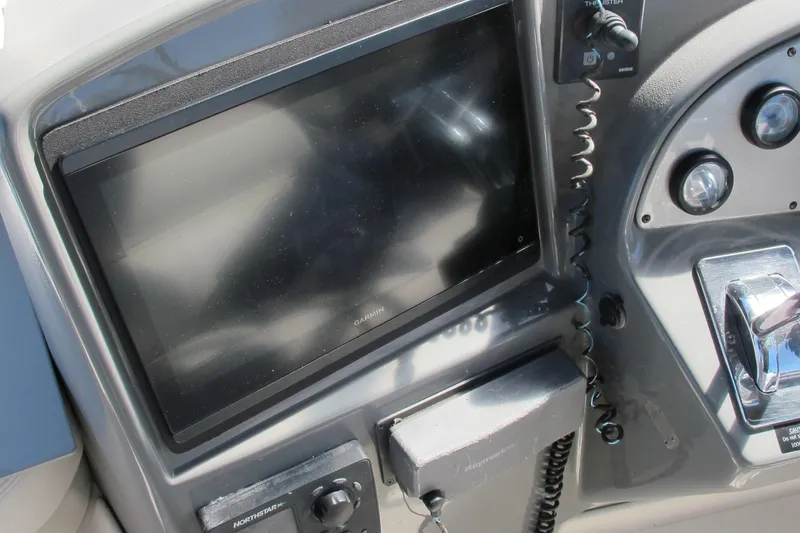 Slide: The Image of Control panel of 2006 Cruisers Yachts 385 Motoryacht with Garmin display and controls. - 14