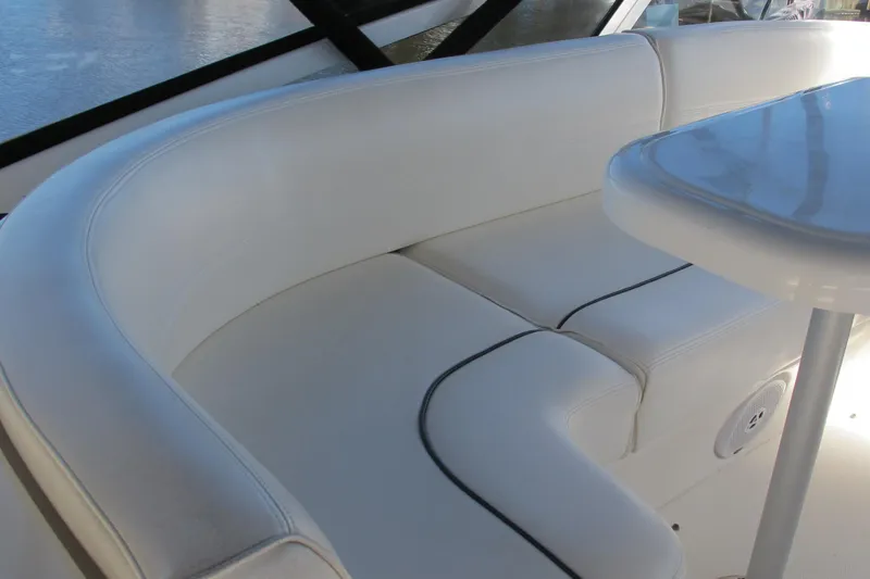 Slide: The Image of Luxurious seating area on 2006 Cruisers Yachts 385 Motoryacht with white upholstery. - 19
