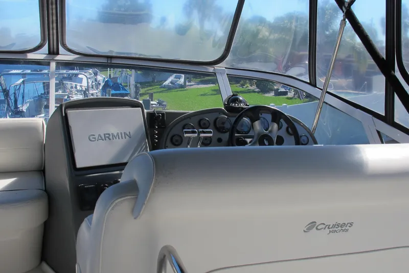 Slide: The Image of 2006 Cruisers Yachts 385 Motoryacht helm with Garmin navigation system. - 21
