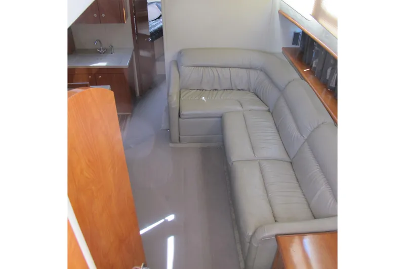 Slide: The Image of Interior of 2006 Cruisers Yachts 385 Motoryacht with leather seating and kitchenette. - 23