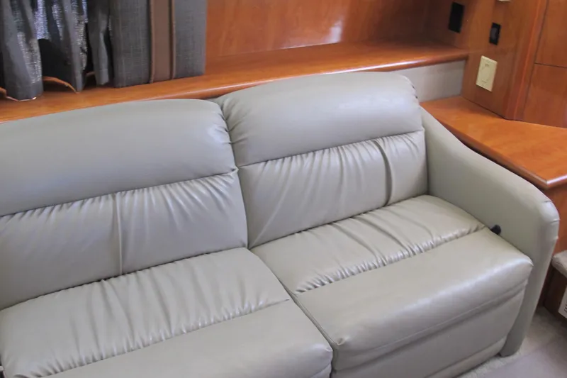 Slide: The Image of Luxurious leather sofa in 2006 Cruisers Yachts 385 Motoryacht interior. - 27