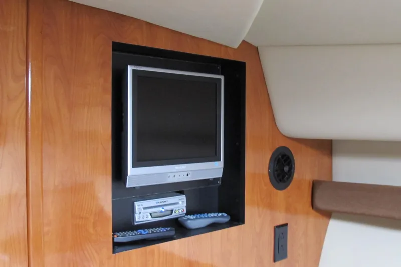 Slide: The Image of 2006 Cruisers Yachts 385 Motoryacht interior with built-in TV and audio system. - 37
