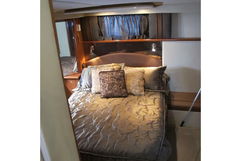 Slide: The Image of Luxurious bedroom interior of 2006 Cruisers Yachts 385 Motoryacht with elegant bedding. - 47