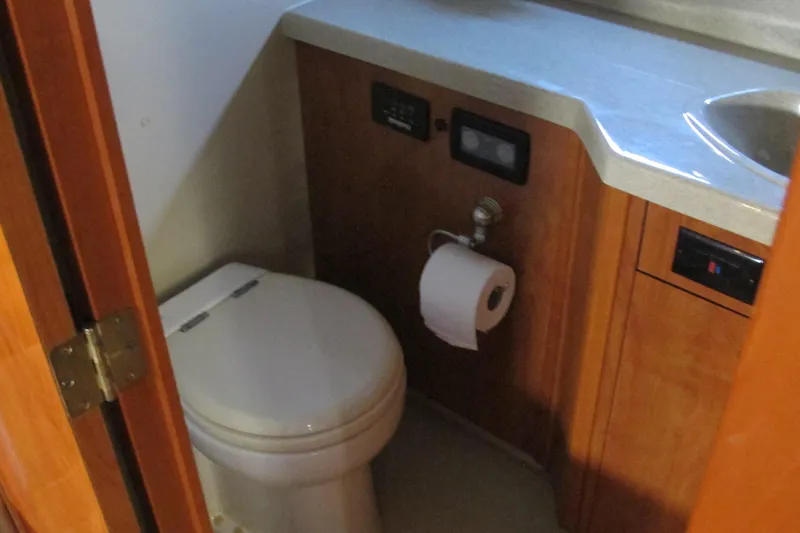 Slide: The Image of Bathroom interior of 2006 Cruisers Yachts 385 Motoryacht with toilet and sink. - 53