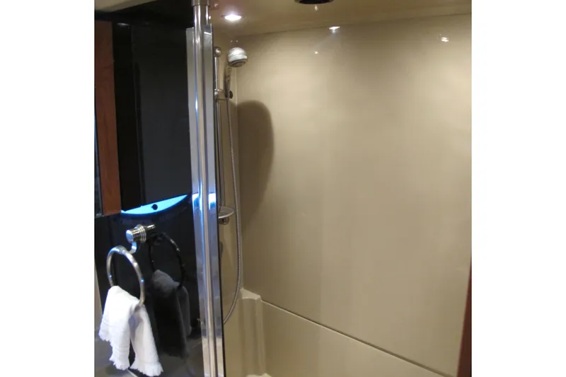 Slide: The Image of Luxurious bathroom interior of 2006 Cruisers Yachts 385 Motoryacht with modern shower design. - 56