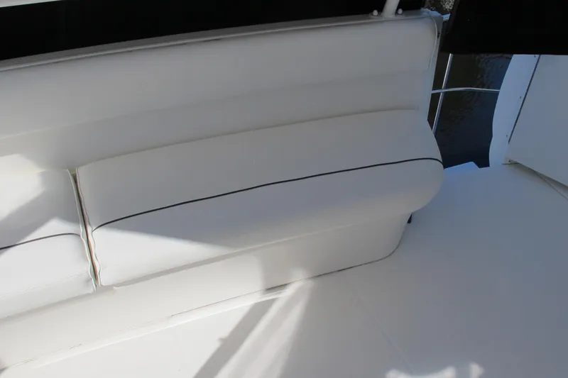Slide: The Image of White seating area on a 2006 Cruisers Yachts 385 Motoryacht. - 9