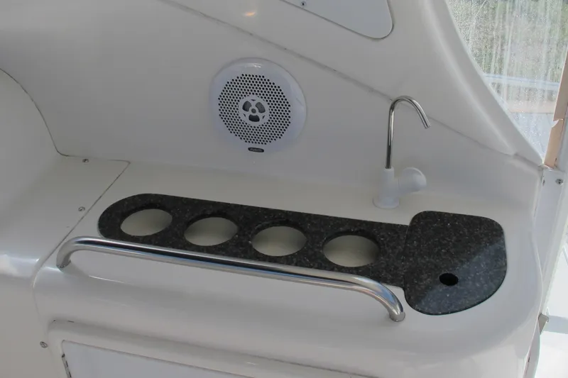 Slide: The Image of 2006 Cruisers Yachts 385 Motoryacht interior with cup holders and speaker. - 10