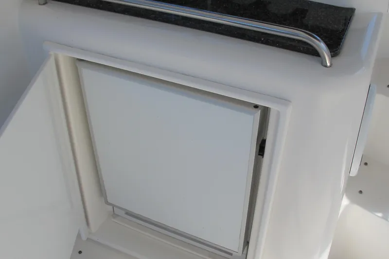 Slide: The Image of 2006 Cruisers Yachts 385 Motoryacht interior detail with white panel and countertop. - 12