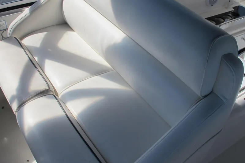 Slide: The Image of White leather seating on 2006 Cruisers Yachts 385 Motoryacht, showcasing luxury and comfort. - 17