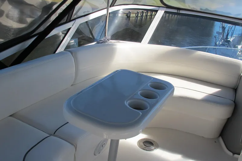 Slide: The Image of Luxurious seating area on 2006 Cruisers Yachts 385 Motoryacht with cupholder table. - 22