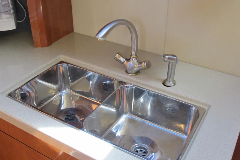 Slide: The Image of Stainless steel sink in 2006 Cruisers Yachts 385 Motoryacht kitchen area. - 31