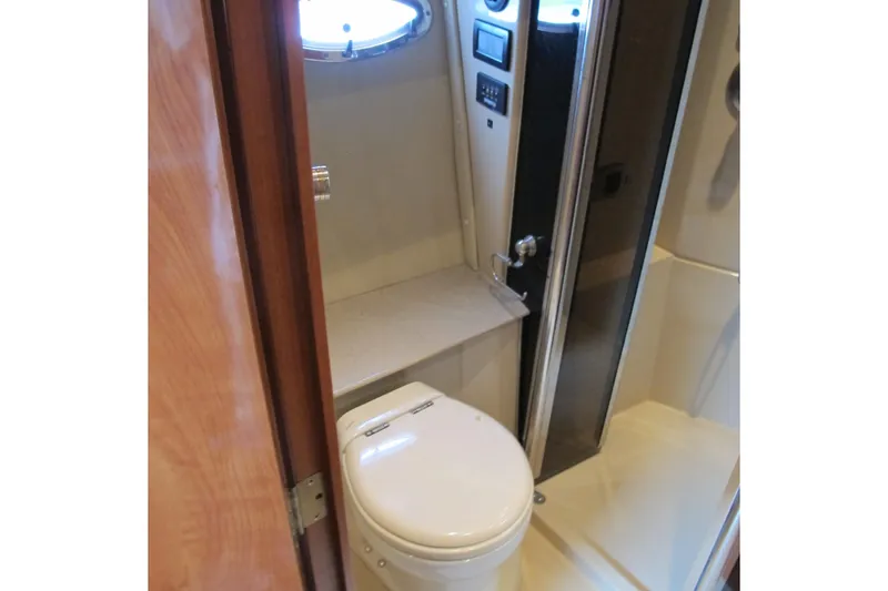 Slide: The Image of Bathroom interior of 2006 Cruisers Yachts 385 Motoryacht with toilet and shower. - 42