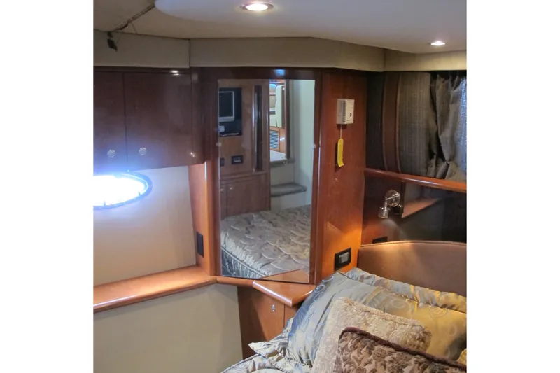 Slide: The Image of Luxurious interior of 2006 Cruisers Yachts 385 Motoryacht with elegant wood finishes. - 51