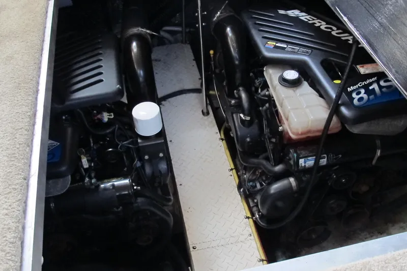 Slide: The Image of Engine compartment of 2006 Cruisers Yachts 385 Motoryacht with MerCruiser 8.1S engines. - 68
