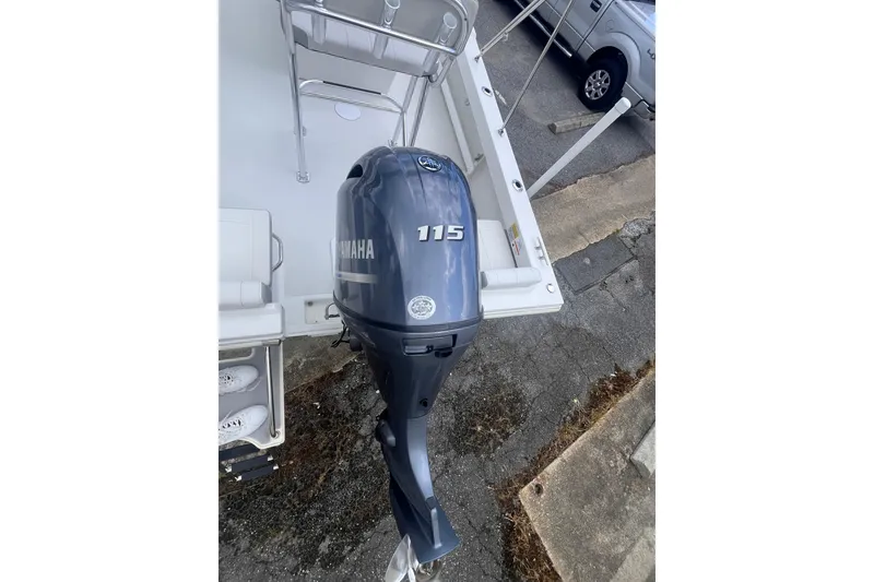 Slide: The Image of 2022 Parker 1801 Center Console boat with Garmin equipment, parked outdoors. - 7