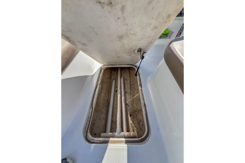 Slide: The Image of Open storage compartment in 2021 Hurricane Center Console SS 211 OB boat. - 28