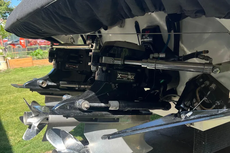 Slide: The Image of Close-up of 2000 Hustler 388 SLINGSHOT boat propellers and drive system. - 4