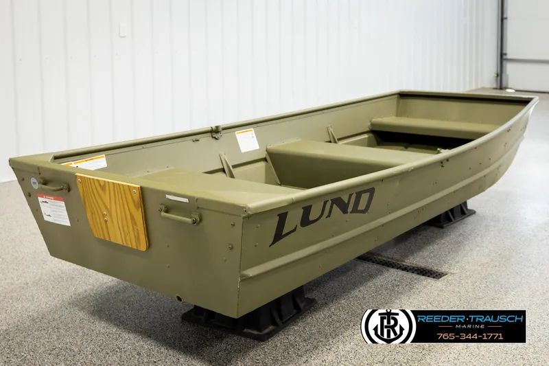 Slide: The Image of 2026 Lund 1040 boat in showroom, olive green, side view. - 4