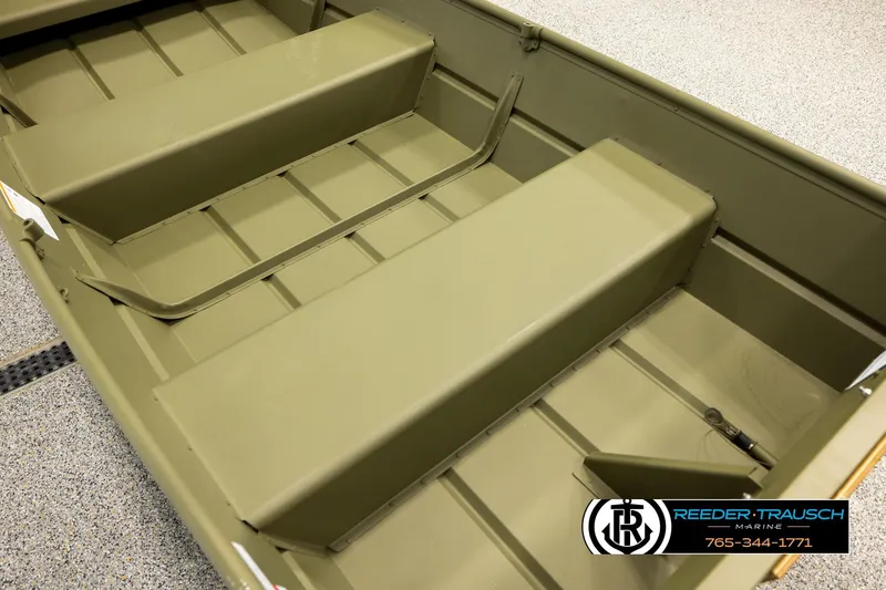 Slide: The Image of 2026 Lund 1040 boat interior with bench seats, showcased by Reeder-Trausch Marine. - 9