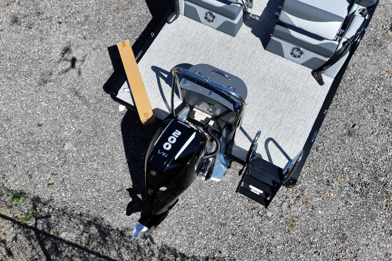 Slide: The Image of 2026 Tahoe Pontoon LTZ Quad Lounger Shift with 200 V6 engine, aerial view. - 2