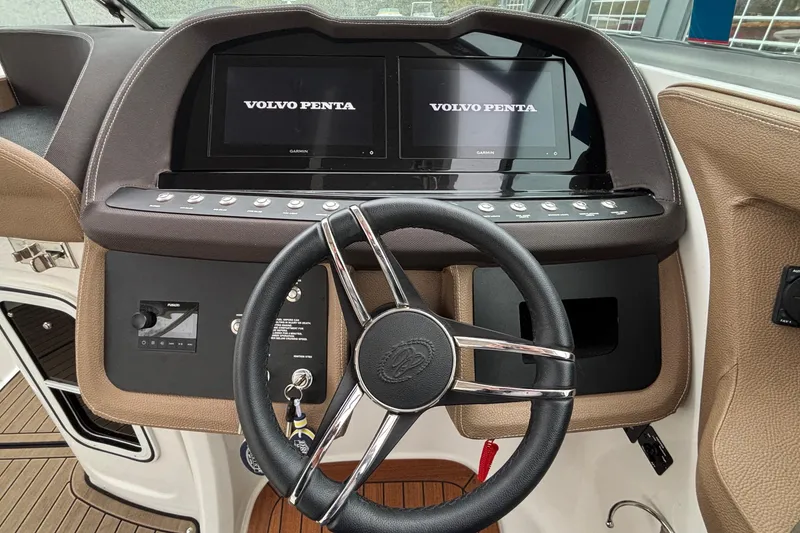 Slide: The Image of Steering wheel and dashboard of 2022 Cobalt R35 boat with Volvo Penta displays. - 47