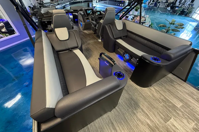 Slide: The Image of 2026 Tahoe Pontoon Cascade Cruise Rear Bench with modern seating and blue LED lighting. - 10