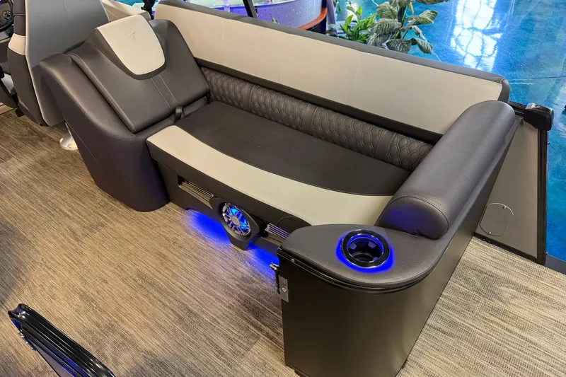 Slide: The Image of Luxurious seating on 2026 Tahoe Pontoon Cascade Cruise Rear Bench with blue LED lighting. - 11