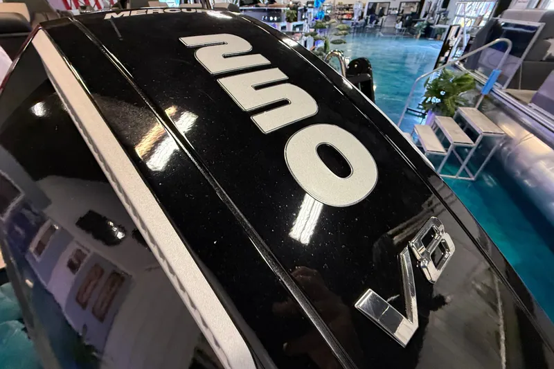 Slide: The Image of Close-up of a 2026 Tahoe Pontoon Cascade Cruise Rear Bench engine, featuring "250" and "V8" labels. - 3