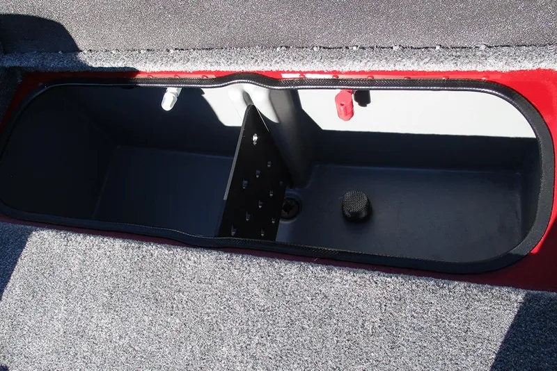 Slide: The Image of 2026 Ranger RT188P Fishing boat storage compartment with carpeted interior. - 23