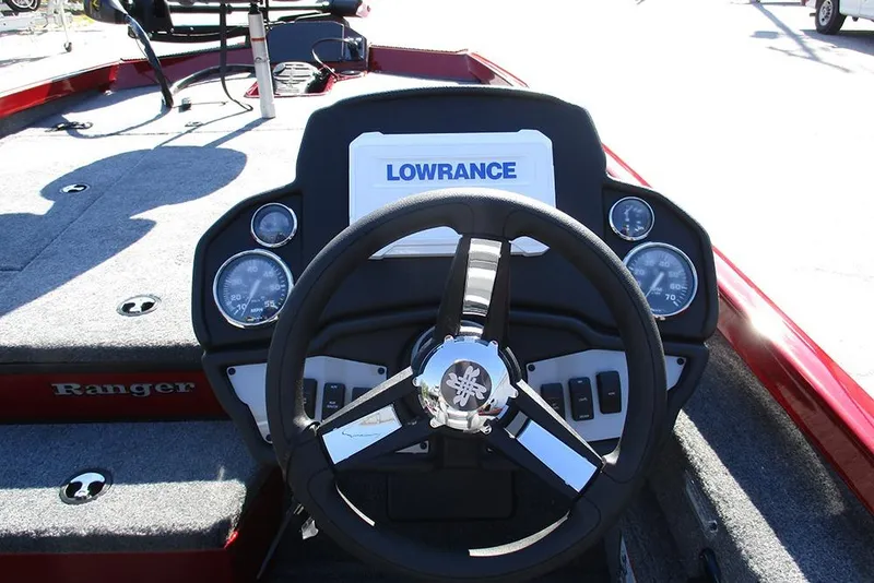 Slide: The Image of 2026 Ranger RT188P Fishing boat dashboard with Lowrance display and steering wheel. - 27