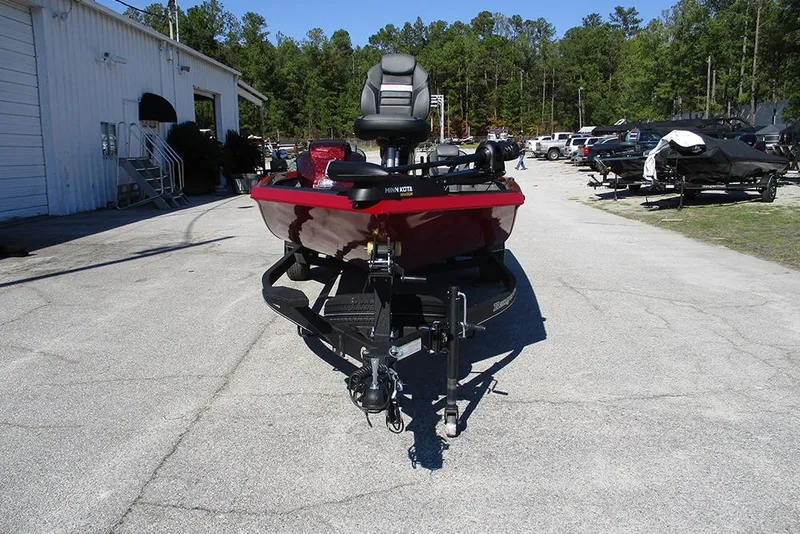 Slide: The Image of 2026 Ranger RT188P Fishing boat in a parking lot, front view. - 4