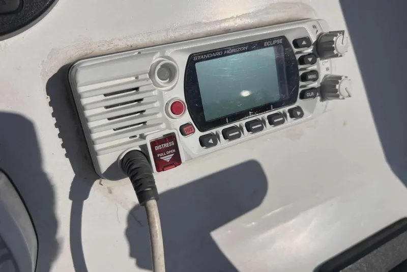 Slide: The Image of Lowrance HDS9 fishfinder on 1997 Gravois 20CC boat dashboard in sunlight. - 10