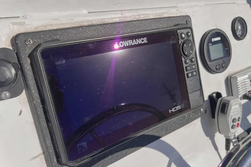 Slide: The Image of Standard Horizon Eclipse marine radio on a 1997 Gravois 20CC boat dashboard. - 9