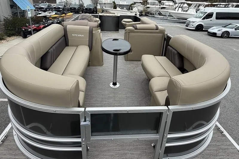 Slide: The Image of 2026 Sylvan Mirage 822 PARTY FISH pontoon boat with spacious seating and table. - 13