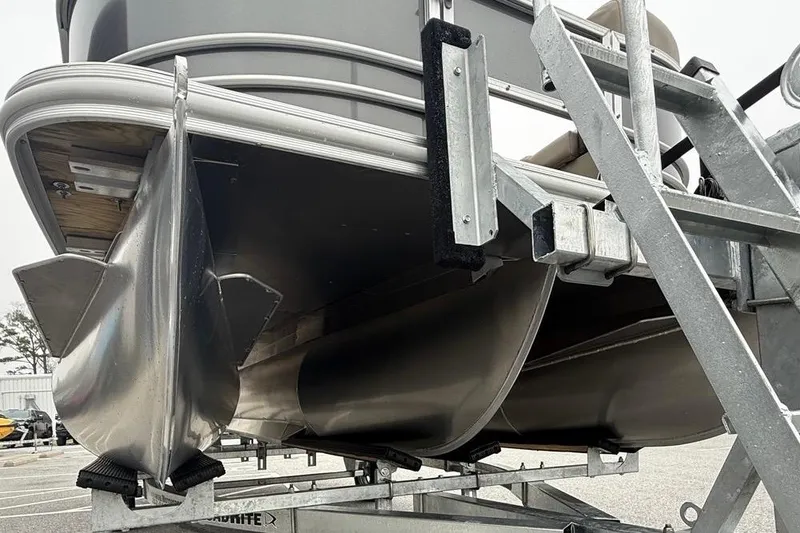 Slide: The Image of 2026 Sylvan Mirage 822 PARTY FISH pontoon boat on trailer, close-up view. - 6