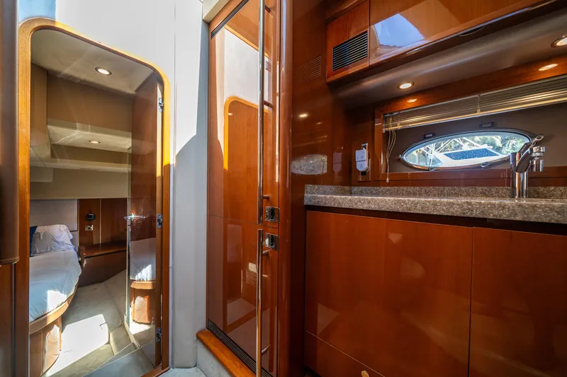 Slide: The Image of Luxurious interior of 2008 Princess 58 Flybridge yacht with wood finishes and modern amenities. - 33