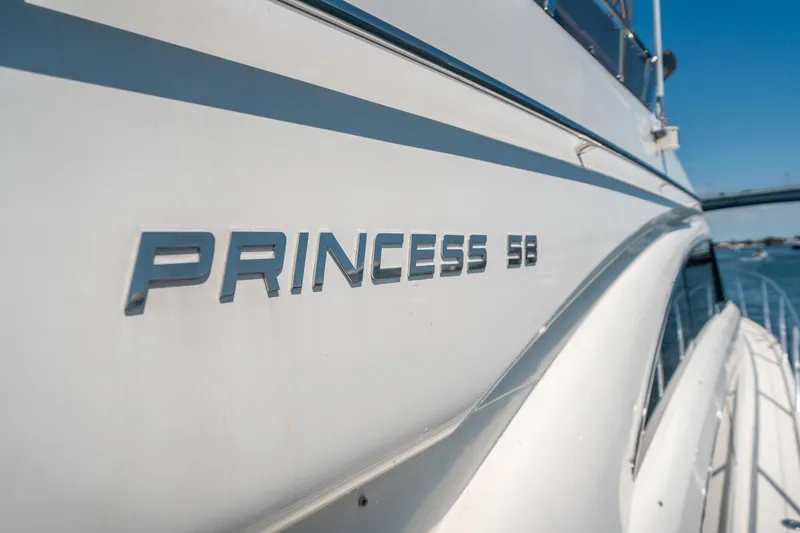 Slide: The Image of 2008 Princess 58 Flybridge yacht, close-up of model name on hull. - 43