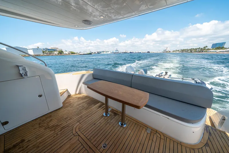 Slide: The Image of Luxury 2008 Princess 58 Flybridge yacht with teak deck and ocean view. - 8
