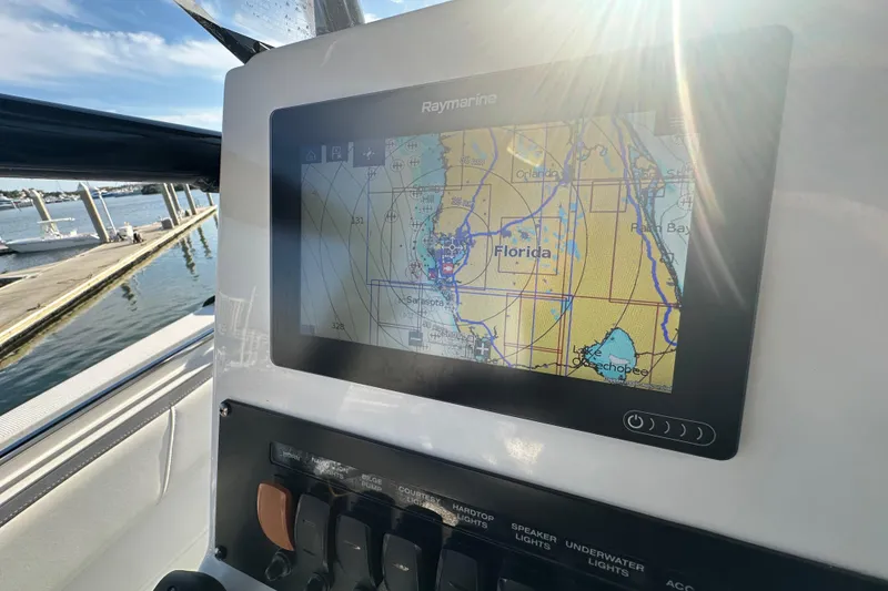 Slide: The Image of Boat navigation system on 2018 Blackfin 212 CC, displaying Florida map in sunlight. - 31