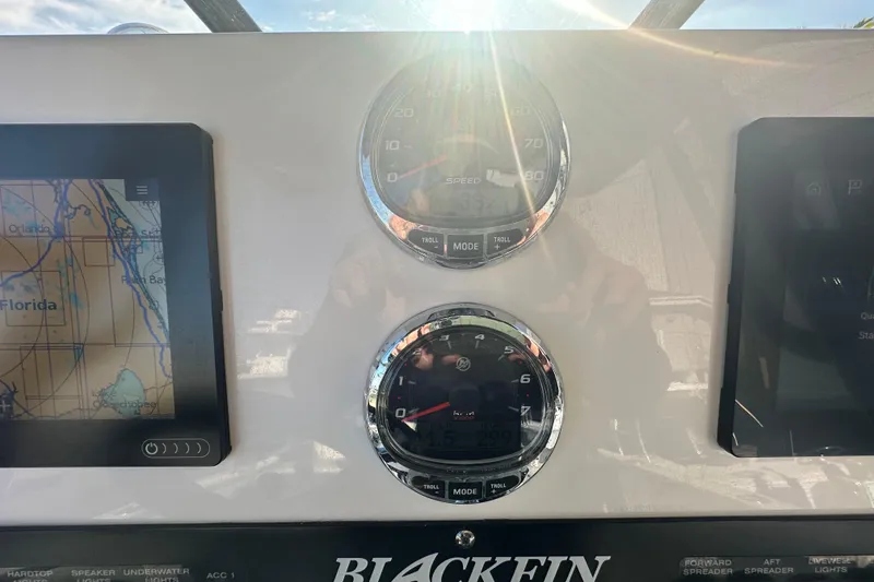 Slide: The Image of Dashboard of 2018 Blackfin 212 CC boat with navigation and speed gauges. - 36