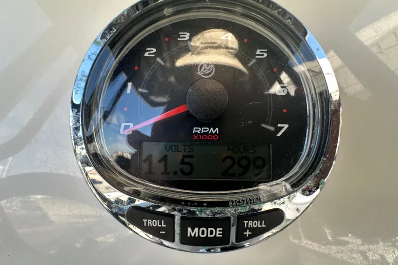 Slide: The Image of Close-up of a 2018 Blackfin 212 CC tachometer displaying RPM, volts, and engine hours. - 37