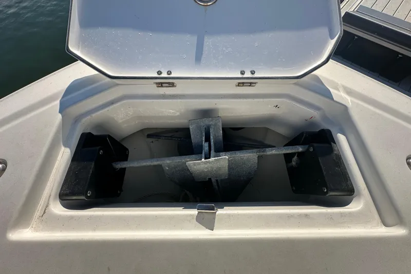 Slide: The Image of Open anchor compartment on 2018 Blackfin 212 CC boat, showing anchor storage. - 51