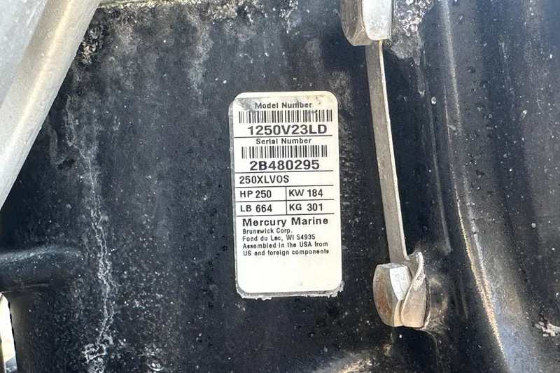 Slide: The Image of Label on Blackfin 212 CC boat engine, displaying model and serial numbers. - 82