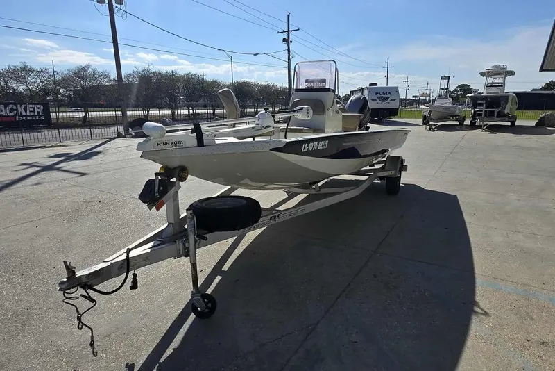 Slide: The Image of 2019 Xpress H20B Bay boat on trailer in outdoor lot. - 7