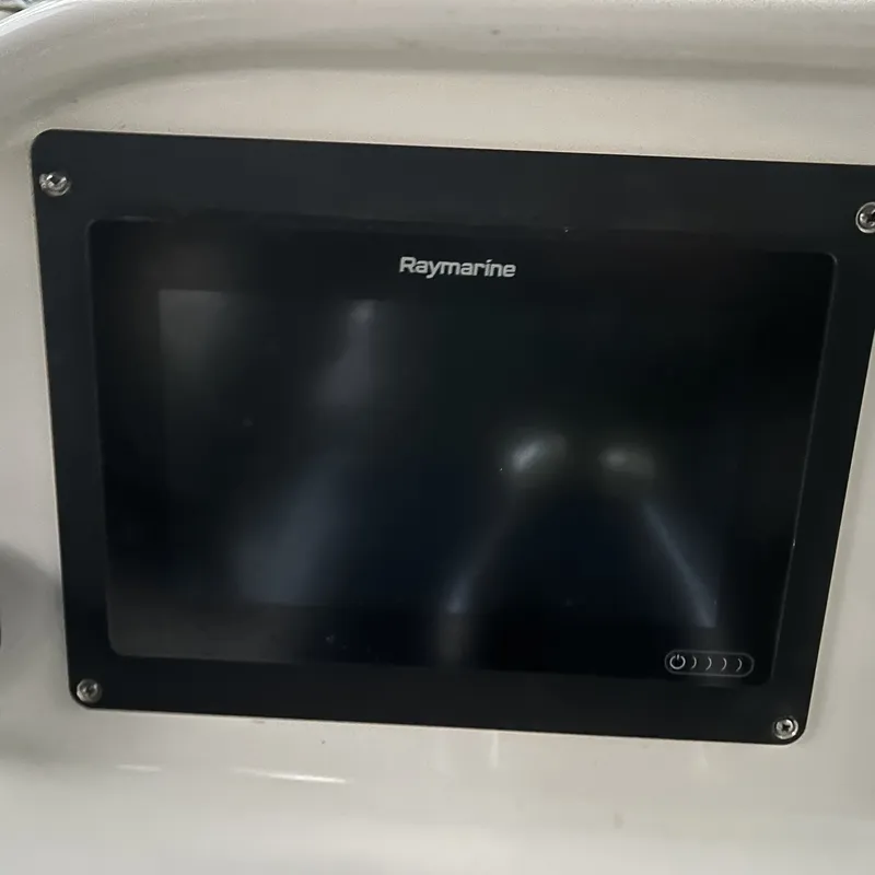 Slide: The Image of Raymarine display on 2005 Sea Ray 290 Amberjack boat dashboard. - 4