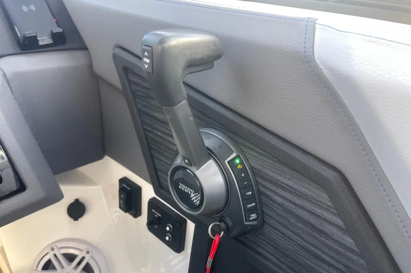 Slide: The Image of 2023 Cobalt R6 Surf boat throttle control with Volvo Penta branding. - 34